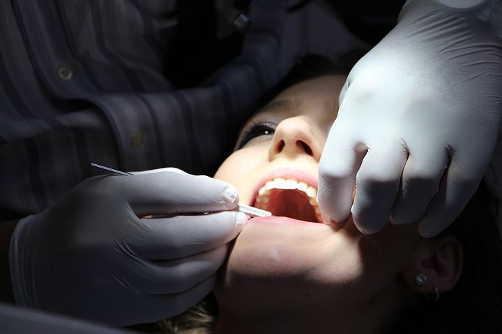 Woman getting a wisdom teeth removal in Mulgrave